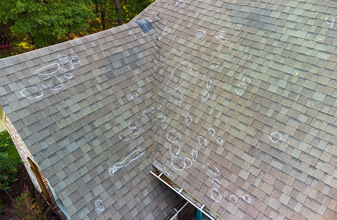 The roof of the damaged house in the hailstorm