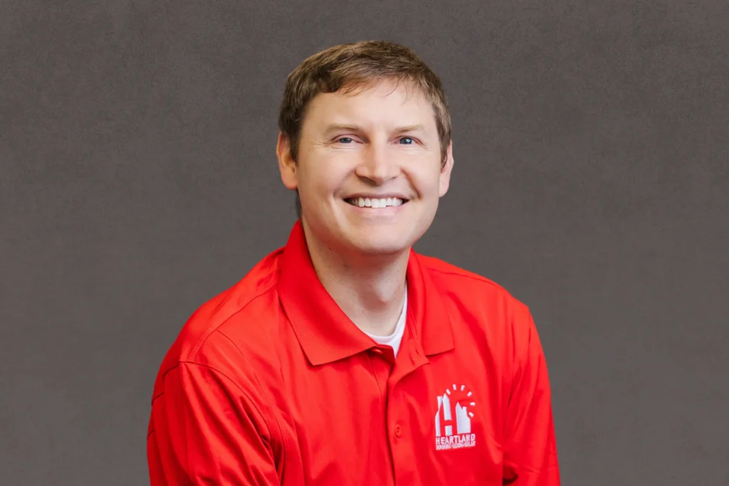 kyle olson headshot-heartland roofing-des moines