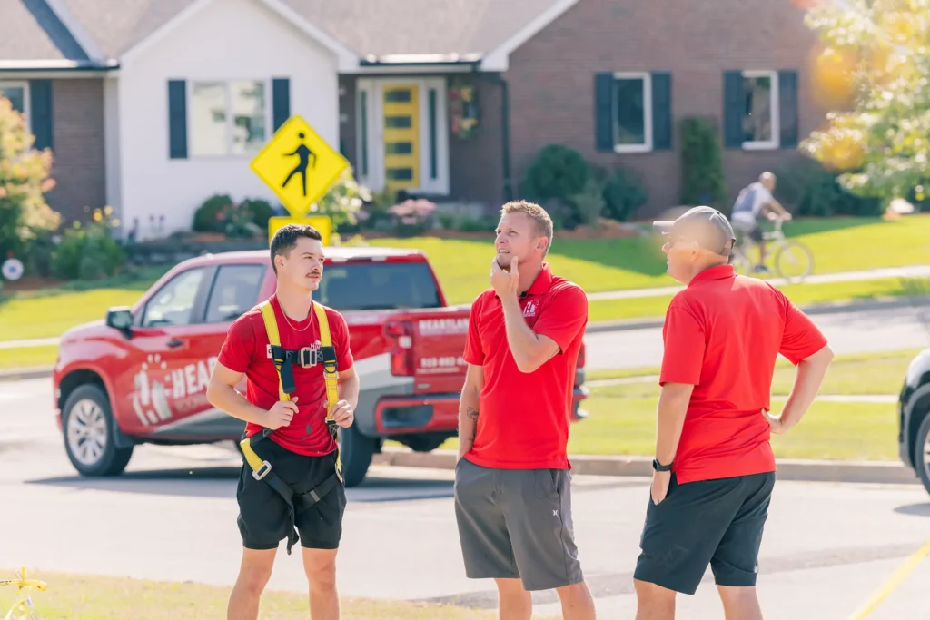 crew standing together-heartland roofing-des moines