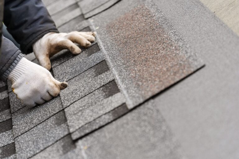 asphalt shingles being installed