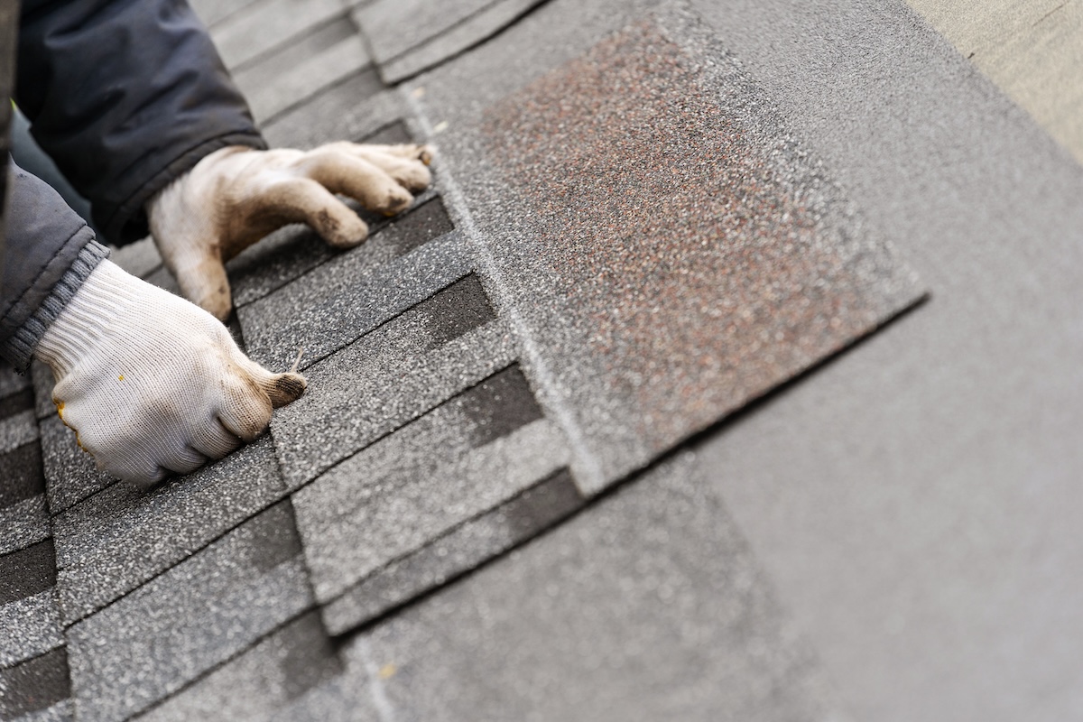asphalt shingles being installed